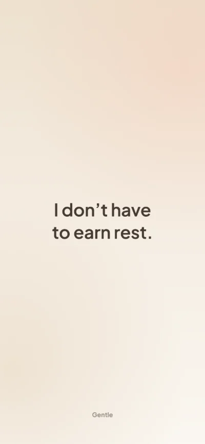 Affirmation wallpaper for iPhone: “I don't have to earn rest.” on a sand background